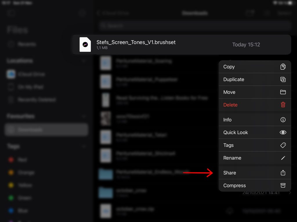 Access the share menu by pressing on the downloaded brush set file.